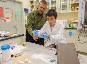 NJIT Professor Som Mitra (left) invented a flexible battery with assistance from Zhiqian Wang, a doctoral student in chemistry.