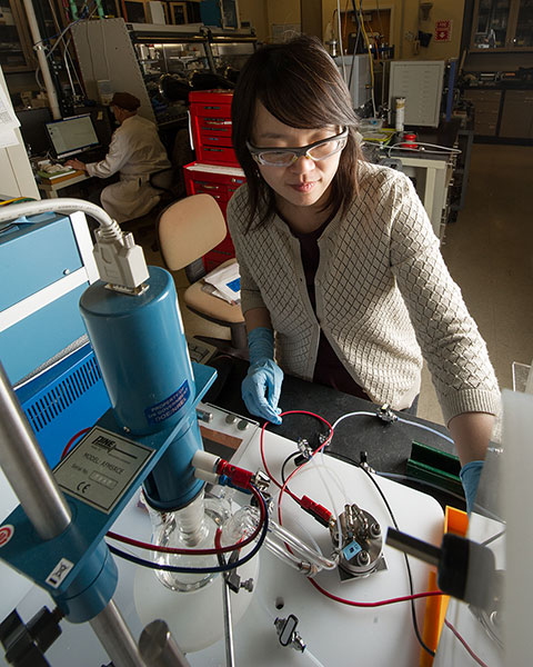 NREL Scientist Chunmei Ban spends a lot of time in the electrochemical storage lab for her work improving lithium-ion batteries through the use of nanomaterials. Photo by Dennis Schroeder, NREL
