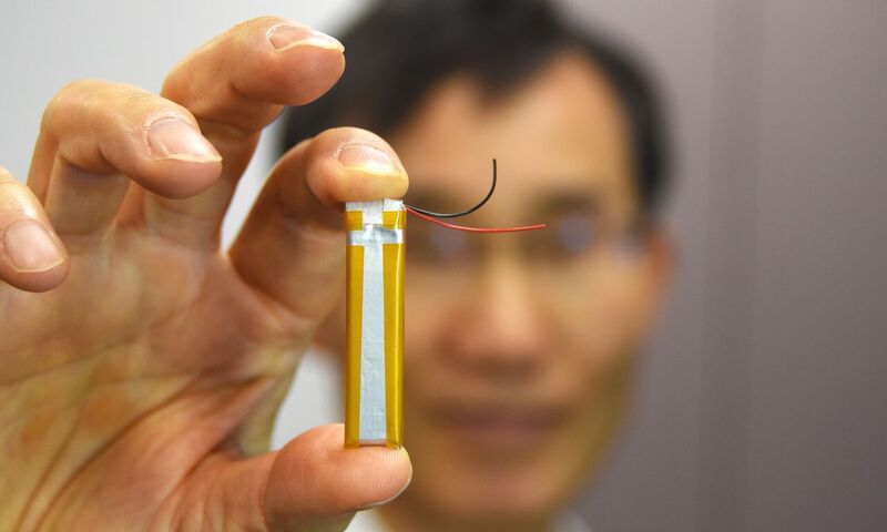Dr. Hong Choi, chief technology officer at Kopin Corporation, holds a new SiMax battery which doubles the capacity of conventional lithium-batteries. Developed with Hitachi Maxell, the new battery technology makes it possible to build smaller, lighter and longer lasting wearables.